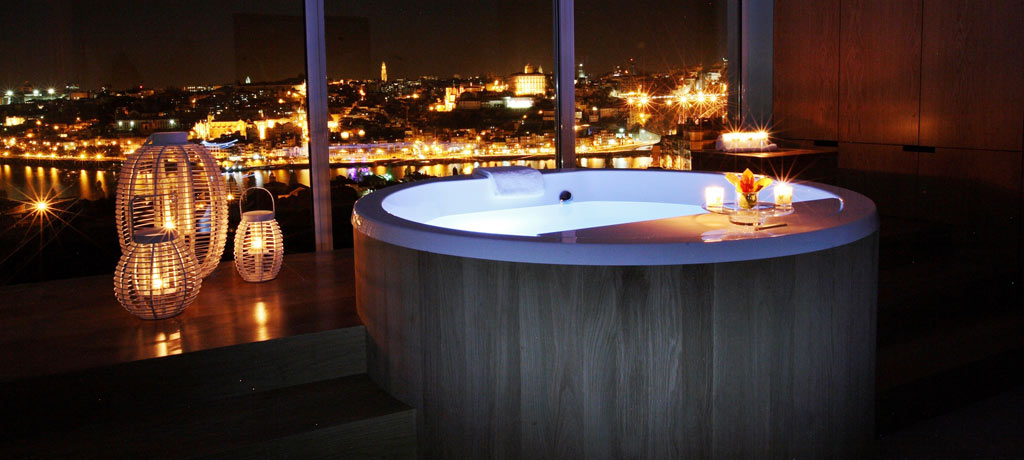 caudalie vinotherapie spa barrel bath at night